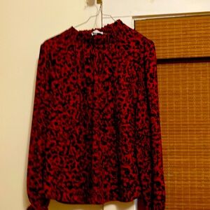 Dressy Blouse. Would look great with a classic black skirt.